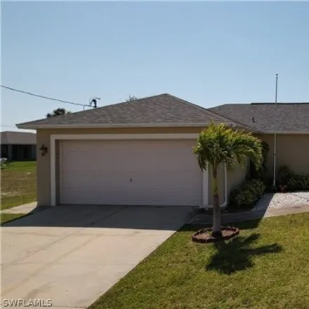 Buy this 3 bed house on 936 Northeast 2nd Place in Cape Coral, FL 33909