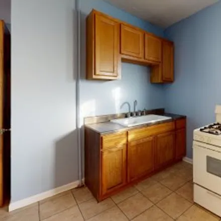 Buy this 6 bed apartment on 2140 North Laramie Avenue in Belmont Cragin, Chicago