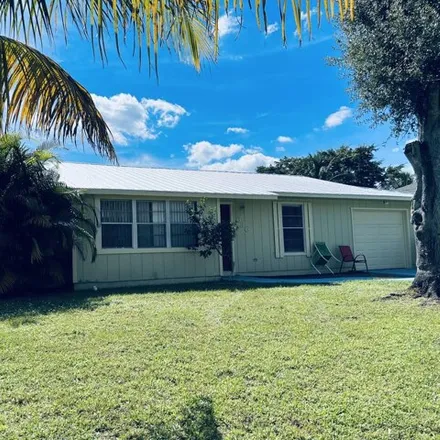 Buy this 3 bed house on 636 Sw Eyerly Ave in Port Saint Lucie, Florida