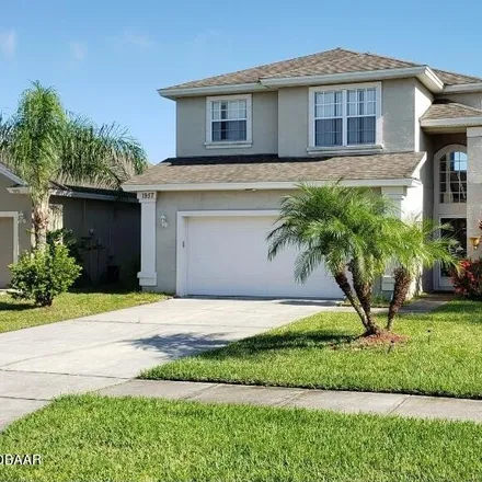 Rent this 4 bed house on 1957 Cove Point Road in Port Orange, FL 32128