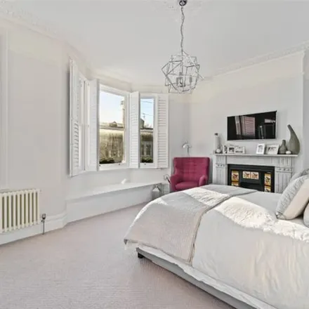 Rent this 5 bed townhouse on 90 Westleigh Avenue in London, SW15 6UZ