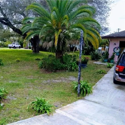 Rent this 2 bed house on 337 Thompson Avenue in Lehigh Acres, FL 33936
