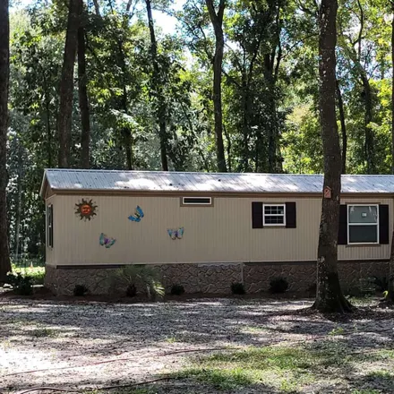 Rent this 3 bed house on 1746 Southwest Newark Drive in Columbia County, FL 32038