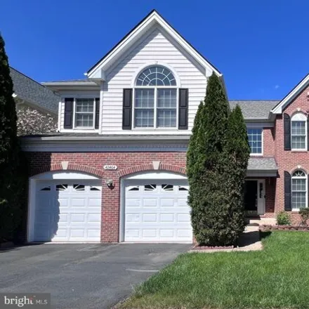 Rent this 4 bed house on 42464 Unicorn Drive in South Riding, VA 20152
