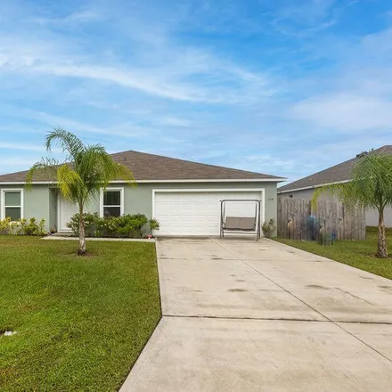 Buy this 4 bed house on 104 Maywood Avenue Northwest in Palm Bay, FL 32907