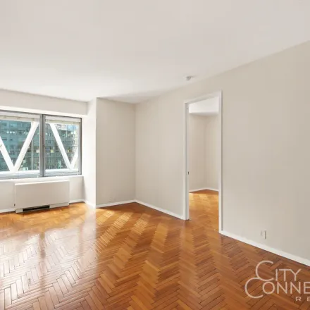 Rent this 3 bed apartment on 871 8th Avenue in New York, NY 10019