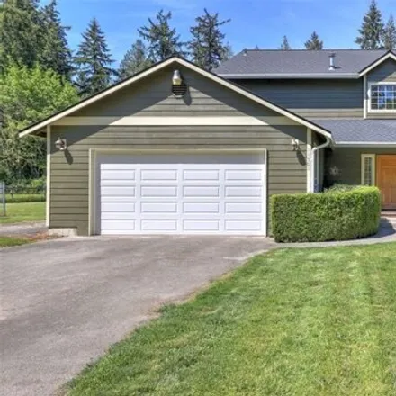 Buy this 4 bed house on 11839 13th Street Court East in Edgewood, WA 98372