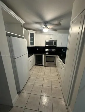 Buy this 3 bed house on 6761 Northwest 182nd Street in Miami-Dade County, FL 33015