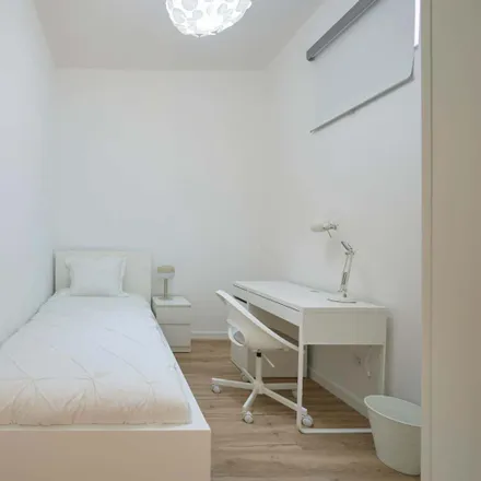 Rent this 6 bed room on MOBI-LSB-00049 in Travessa de Santa Marta, 1150-297 Lisbon
