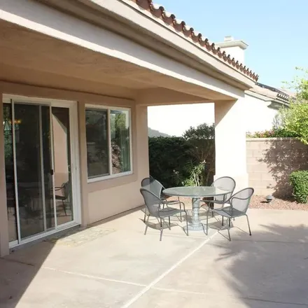 Rent this 2 bed apartment on 37285 Turnberry Isle Drive in Palm Desert, CA 92211