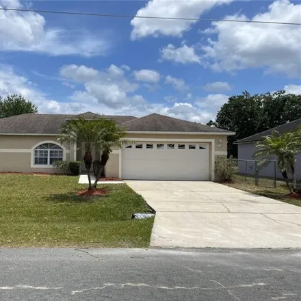 Buy this 3 bed house on 405 Martigues Drive in Poinciana, FL 34759
