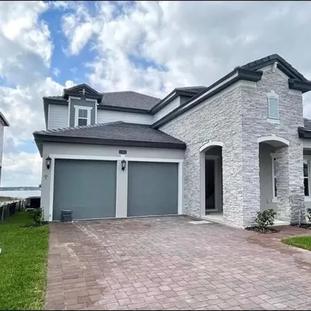 Rent this 5 bed house on 7416 Alpine Butterfly Ln in Orlando, Florida