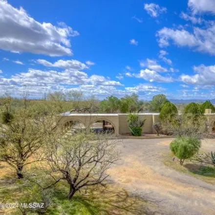 Buy this 4 bed house on 1609 West Caspian Drive in Casas Adobes, AZ 85704
