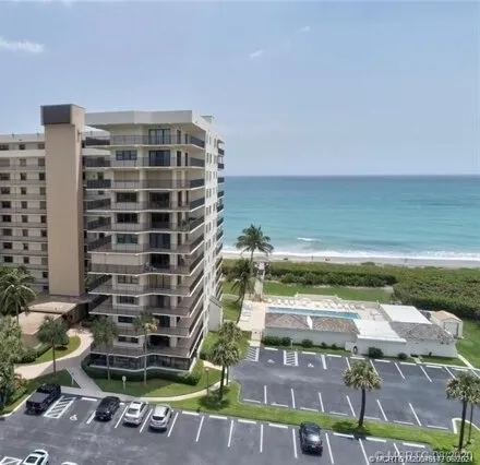 Rent this 2 bed condo on 10044 S Ocean Dr Apt 102 in Jensen Beach, Florida