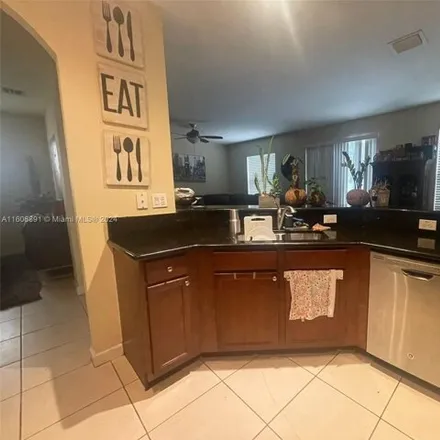 Rent this 4 bed house on 8655 W 33rd Ave Unit 8655 in Hialeah, Florida