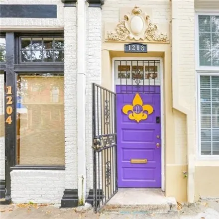 Rent this 3 bed condo on 1208 Carondelet Street in New Orleans, LA 70130