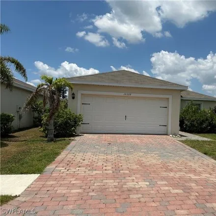 Rent this 3 bed house on 10360 Silver Pond Lane in Lehigh Acres, FL 33936
