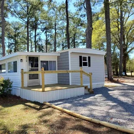 Buy this studio apartment on 473 Delton Drive in Garden City Beach, Horry County