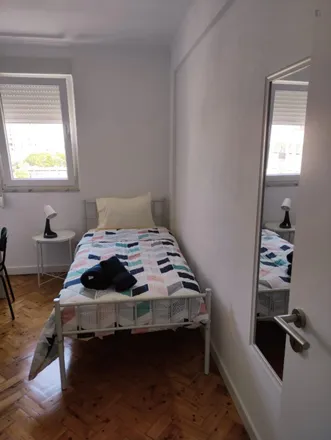 Rent this 6 bed room on Rua Cidade de Porto Alexandre LT 207 in 1800-100 Lisbon, Portugal