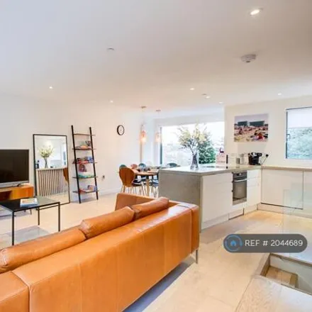Rent this 4 bed townhouse on Savona Close in London, SW19 4HT