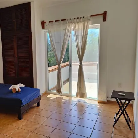 Rent this 3 bed house on Bahías de Huatulco International Airport in MEX 200, Aguaje el Zapote