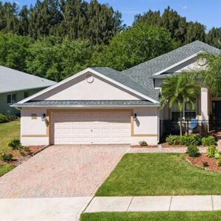 Buy this 4 bed house on 1390 Cibola Drive in Melbourne, FL 32934