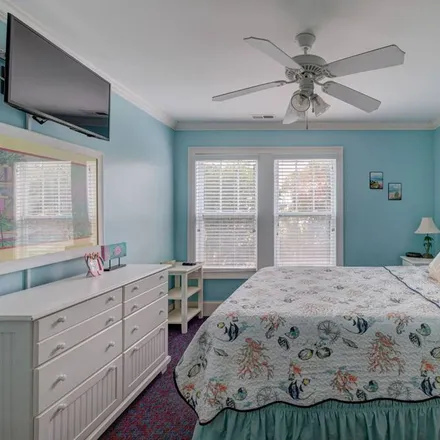 Rent this 6 bed condo on Carolina Beach