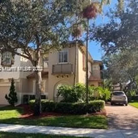 Rent this 3 bed townhouse on 5745 Northwest 120th Avenue in Heron Bay South, Coral Springs