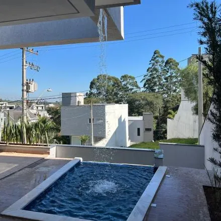 Buy this 3 bed house on Avenida Prefeito Francisco Ribeiro Nogueira in Mogi Moderno, Mogi das Cruzes - SP