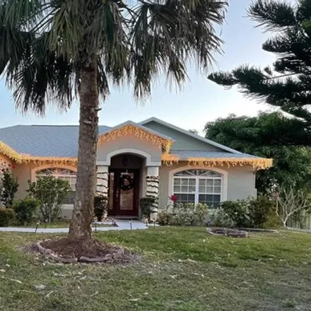 Buy this 4 bed house on 1671 Southwest Althea Street in Port Saint Lucie, FL 34953