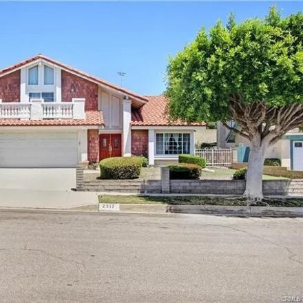 Rent this 4 bed house on 2317 Santa Fe Ave in Torrance, California