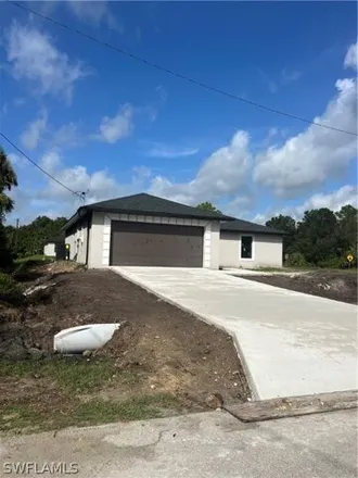 Rent this 3 bed house on 2524 35th Street Southwest in Lehigh Acres, FL 33976