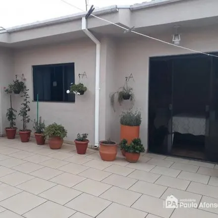 Buy this 3 bed house on Rua Hélio Brandão Dias in Região Urbana Homogênea XXIII, Poços de Caldas - MG