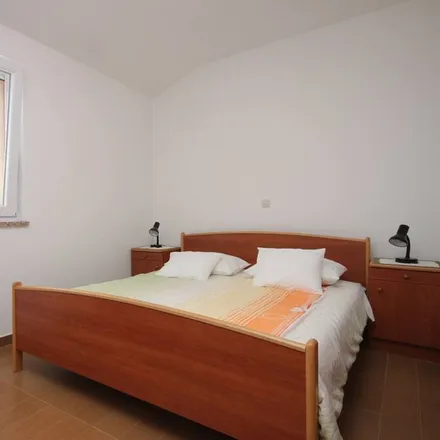 Rent this 2 bed apartment on 23286 Božava