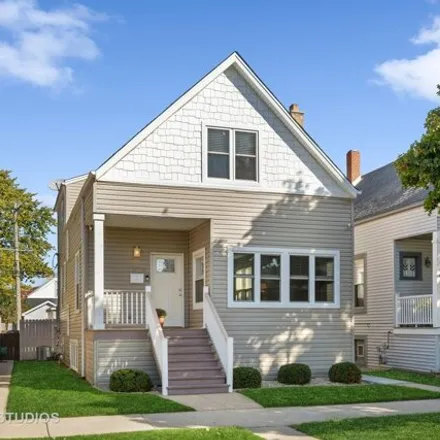 Buy this 4 bed house on 5028 West Waveland Avenue in Chicago, IL 60634
