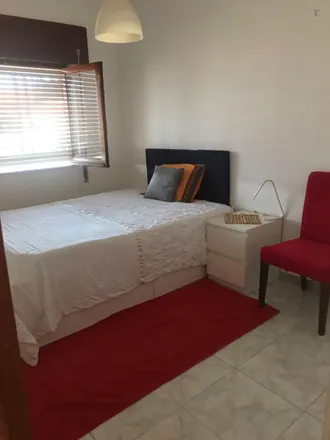 Rent this 2 bed room on Rua Dom Afonso de Albuquerque in 2830-186 Santo André, Portugal