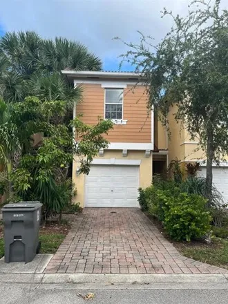 Rent this 3 bed house on 864 Pipers Cay Dr in West Palm Beach, Florida