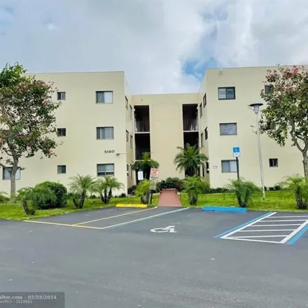 Buy this 2 bed condo on 5100 Las Verdes Circle in County Club Acres, Palm Beach County