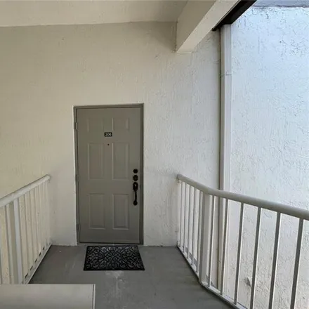 Rent this 2 bed condo on 4311 Sw 160th Ave Apt 206 in Miramar, Florida