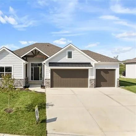 Buy this 4 bed house on 945 Bridgeshire Drive in Raymore, MO 64083