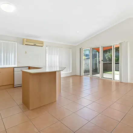 Rent this 4 bed apartment on 16 Santana Road in Coomera QLD 4209, Australia