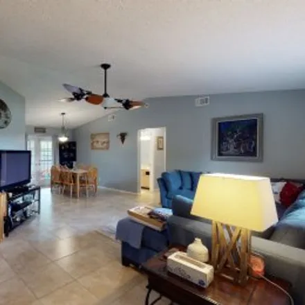 Rent this 3 bed apartment on 1005 Southwest 22Nd Ter in Trafalgar, Cape Coral