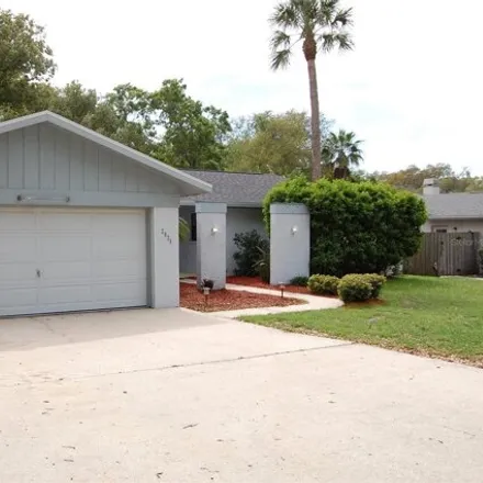 Rent this 3 bed house on 2816 Rustic Oaks Drive in Pinellas County, FL 34684