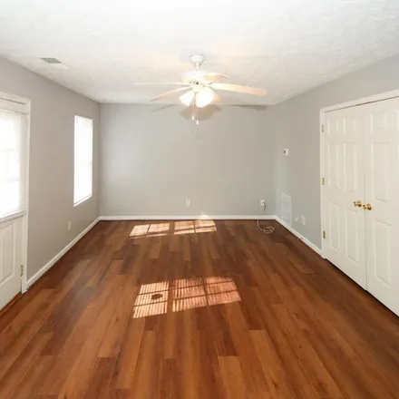 Rent this 3 bed townhouse on 5689 Strathmoor Manor Circle in Lithonia, DeKalb County