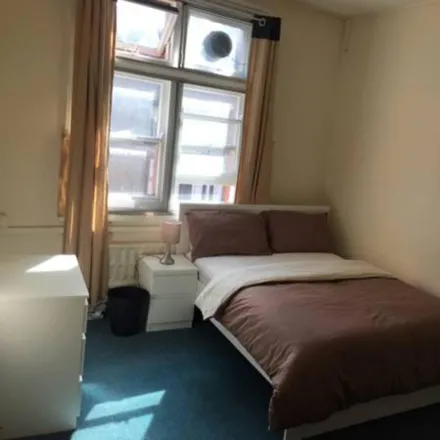 Rent this 4 bed room on IT Wizards & Dry Cleaners in Wimbledon Hill Road, London