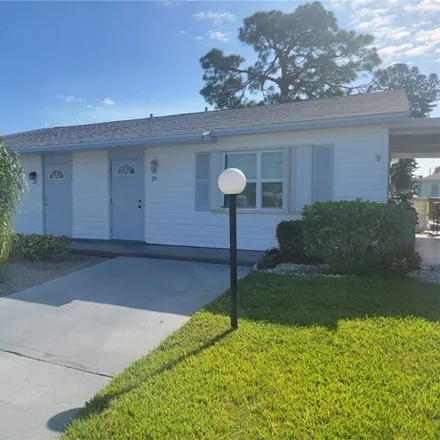Rent this 2 bed house on 58 Dawn Flower Circle in Lehigh Acres, FL 33936