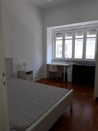 Rent this 5 bed room on Rose Stupa in Rua de Ponta Delgada 80B, 1000-046 Lisbon