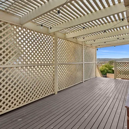 Rent this 4 bed townhouse on Delmar Crescent in Karabar NSW 2620, Australia