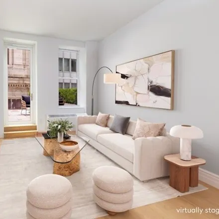 Rent this studio condo on 80 Pine Street in New York, NY 10005