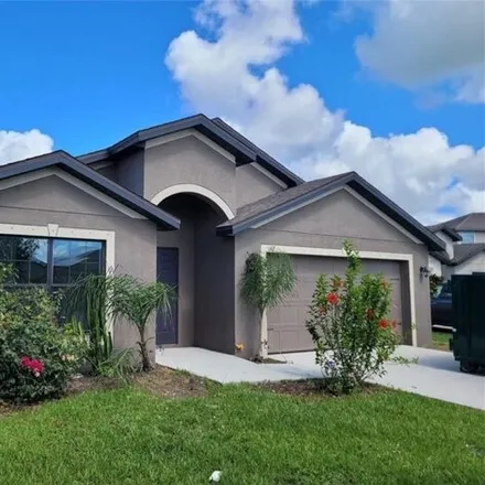 Rent this 4 bed house on 114 Shadowview Court in Lehigh Acres, FL 33974